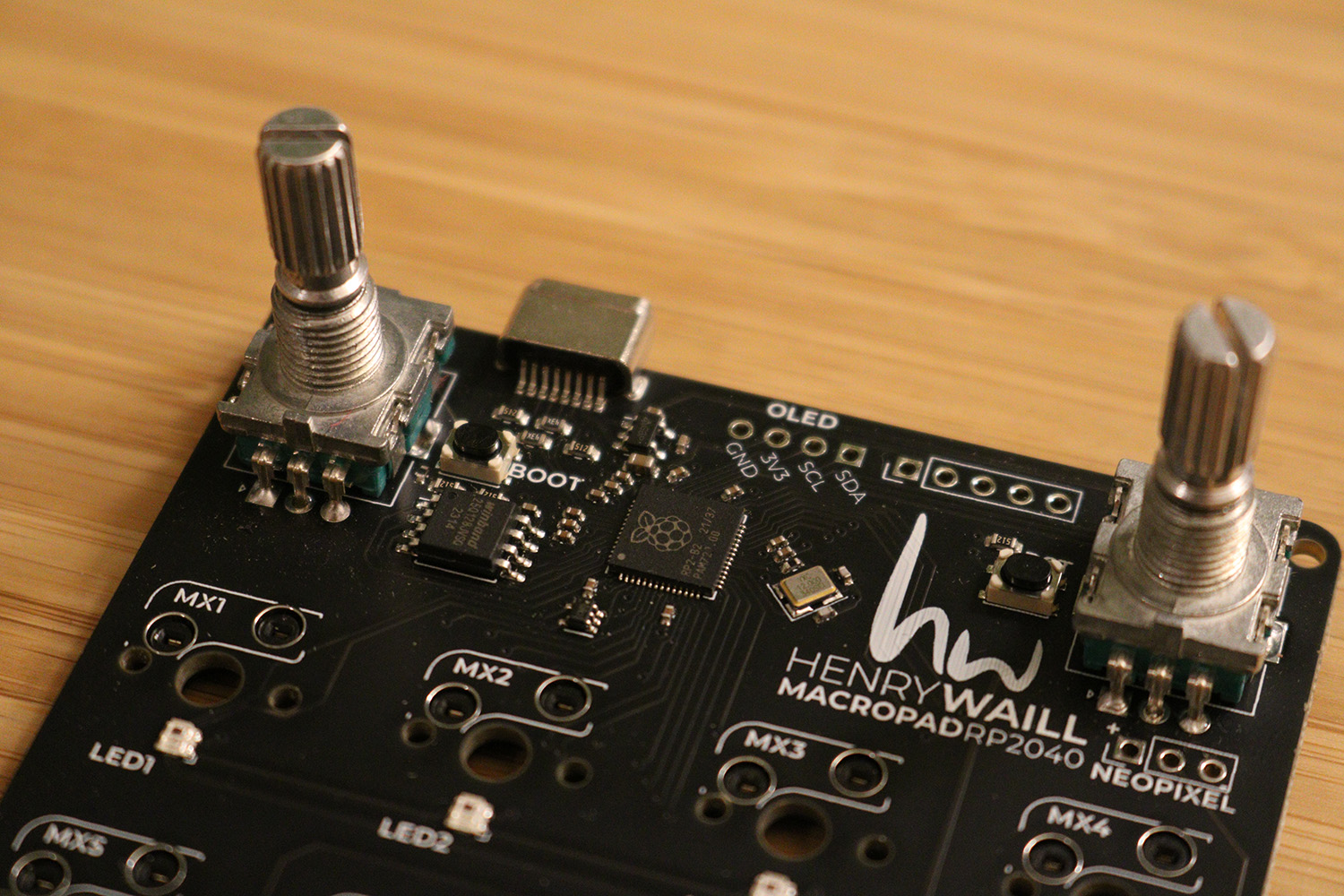 Close-up view of the custom microcontroller PCB.